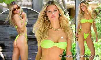 Joy Corrigan Shows Off Her Jaw Dropping Figure In A Neon Green Bikini