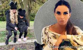 Katie Price enjoys a family day out with her daughters Princess, 12, and Bunny, 5