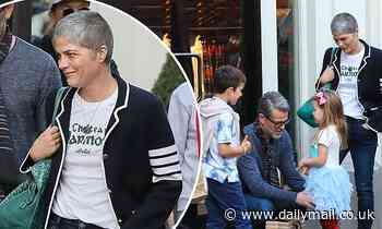 Selma Blair prepares for the holidays as she hits the mall with boyfriend David Lyons and their kids