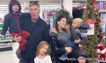Hiliaria and Alec Baldwin pose with their kids in a store as she jokes about 'holiday card realness'