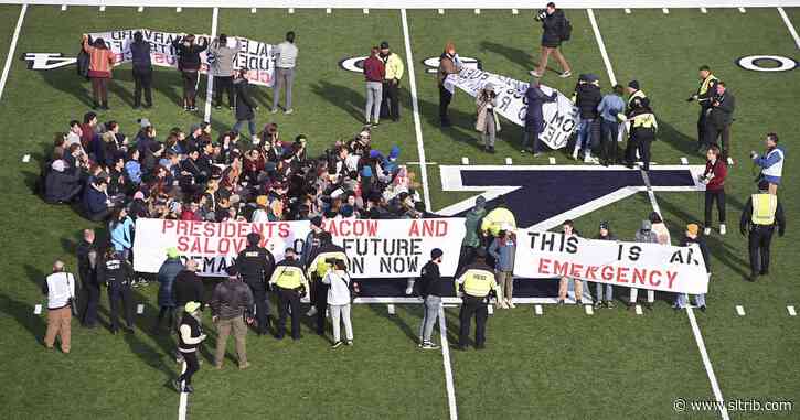Harvard-Yale game delayed at halftime by student climate change protest