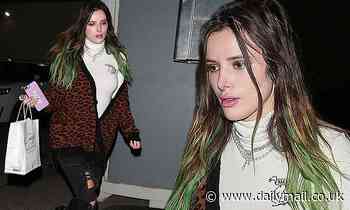 Bella Thorne takes a walk on the wild side in cheetah print cardigan