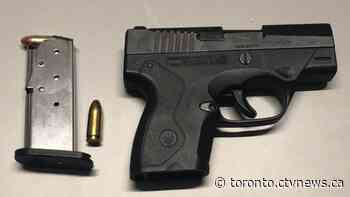 Charges laid after a gun is found inside a vehicle during a ride spot check
