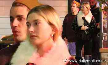 Justin and Hailey Bieber take their pooch to dinner in Hollywood one day after Hailey's birthday