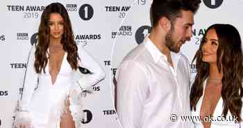 Maura Higgins demands attention in revealing white minidress on red carpet with Curtis Pritchard