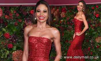 Emma Weymouth looks radiant in red strapless gown as she attends Evening Standard Theatre Awards 