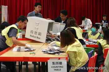 Pro-democracy candidates surge, pro-Beijing candidates suffer amid record turnout in Hong Kong elections