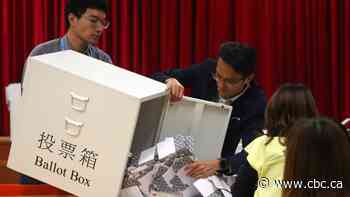Hong Kong pro-democracy candidates win nearly half of seats in elections, early results show