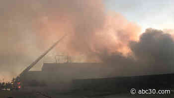 Firefighters battling green waste fire in southeast Fresno