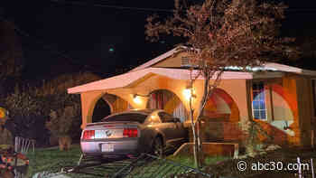 Driver injured after crashing into Parlier home