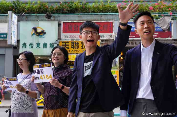 Pro-democracy camp wins Hong Kong elections in landslide