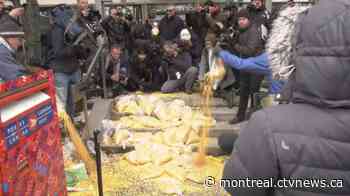 Farmers dump corn at PM's office demanding end to CN Rail strike, propane shortage