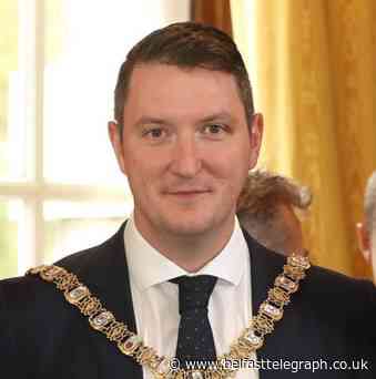 Belfast Lord Mayor John Finucane 'deeply sorry' after being caught by police urinating in street