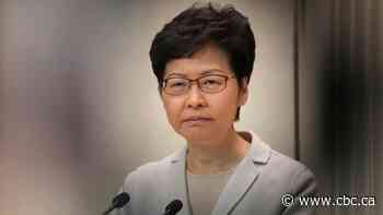 Hong Kong leader refuses to give ground after pro-democracy bloc wins by landslide