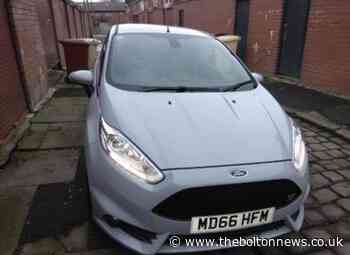 Police search for car stolen outside a Bradshaw house