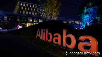 Alibaba's Hong Kong Shares Rise 6.6 Percent on Debut in Heavy Volume