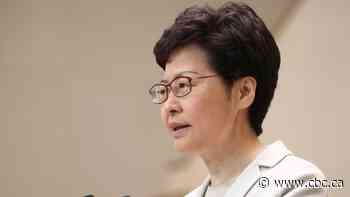 Humiliated at polls, Hong Kong's leader acknowledges discontent with government