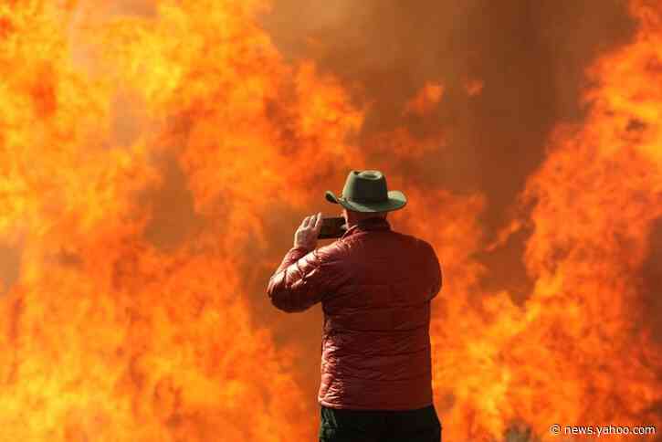 Wildfire menaces Santa Barbara hillside homes but rain on the way