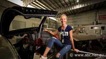 Aviation fanatic looks after the last F-111 to switch off its engines