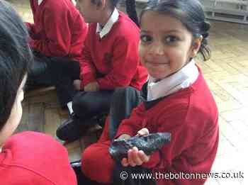 Moss Park Junior School children have a chance to handle rare moon samples brought back to Earth from space
