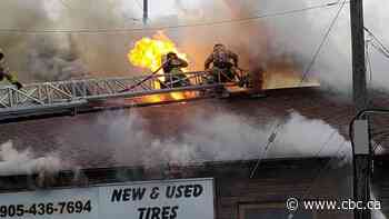 Crews fight fire at Oshawa tire shop