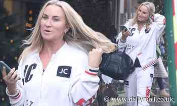 Meg Matthews, 53, puts on a casual display in a white Juicy Couture tracksuit