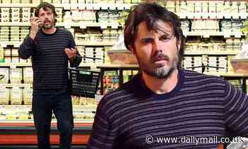 Casey Affleck sports a scruffy beard for some last minute grocery shopping before Thanksgiving 