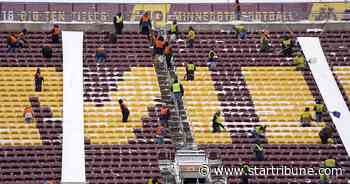Think shoveling the sidewalk is hard work? Try clearing TCF Bank Stadium
