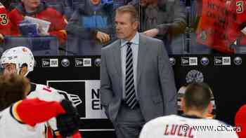 Flames need OT to beat Sabres in 1st game since racism allegations sidelined coach