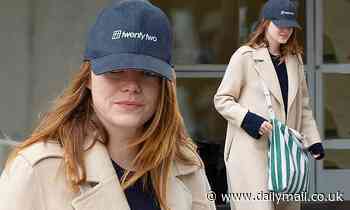 Emma Stone is fresh and makeup-free as she arrives in New York for Thanksgiving