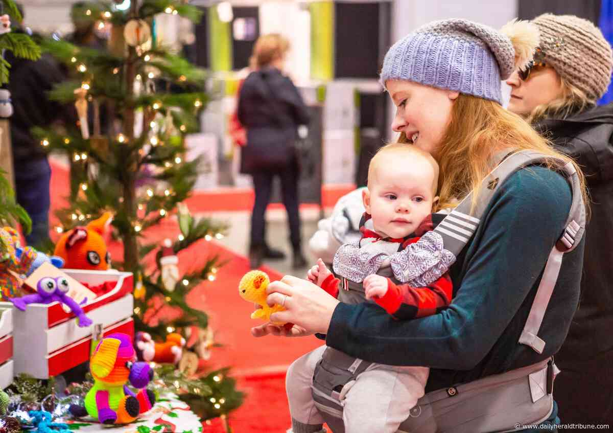 Photos: Farmers' Market hosts Christmas show sale