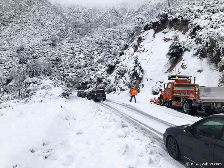 California snow-bound highway reopens but storm snarls Thanksgiving travel