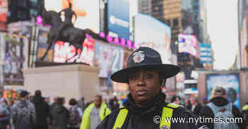 They Keep Times Square in Order, and a Statue Front and Center