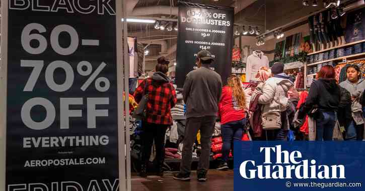 US consumers spend $2bn online but store crowds thin as Black Friday dawns