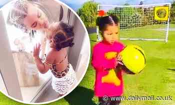 Khloe Kardashian and True play soccer as reality star admits she's stayed away from her phone