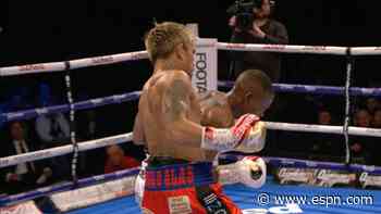Casimero beats Zolani for world 118 lbs. title