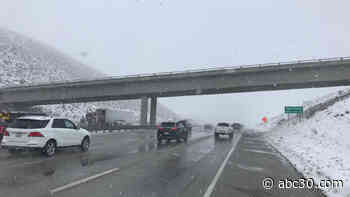 CHP pacing traffic over I-5 at Grapevine, Wind Warning in effect