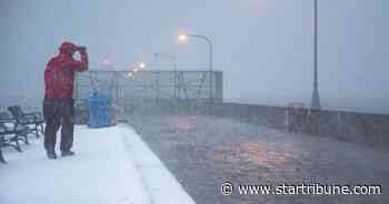 Duluth blanketed with 19 inches of snow; waves pound canal area