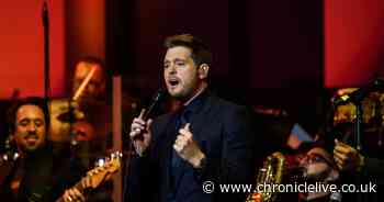 See the charming moment Michael Buble receives a Christmas card from a young superhero