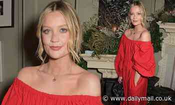 Laura Whitmore cuts a stylish figure in a billowing bardot gown at British Fashion Awards party