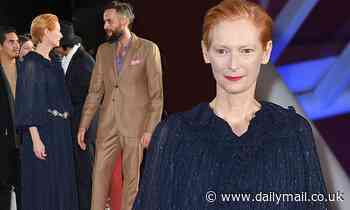 Tilda Swinton, 59, oozes sophistication in a beaded gown with her partner Sandro Kopp, 41