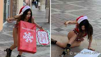 Liziane Gutierrez Takes a Spill on Skates in Christmas Bikini