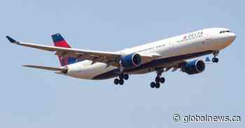 Emergency evacuation slide falls from plane, lands in Boston backyard