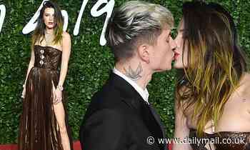 Bella Thorne kisses boyfriend Benjamin Mascolo on the red carpet of the British Fashion Awards