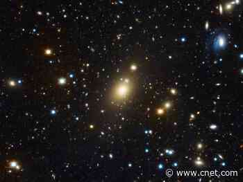 Astronomers spot most ultramassive black hole ever found in our local universe     - CNET