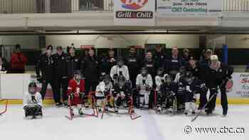 Young hockey players in La Ronge get new gear courtesy of NHL players, local officer