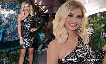 Love Island's Amy Hart puts on a leggy display in silver sequin asymmetric gown