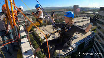Adrenaline Seekers Rappel down 17 Floors for a Good Cause