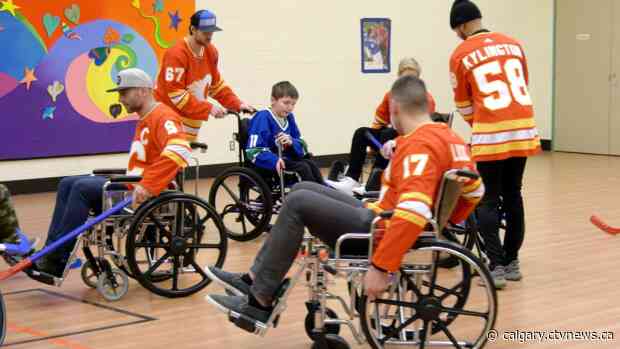 Calgary Flames bring holiday cheer to Alberta Children’s Hospital