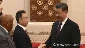 Xi Jinping sends strong message with handshake for Australian political donor